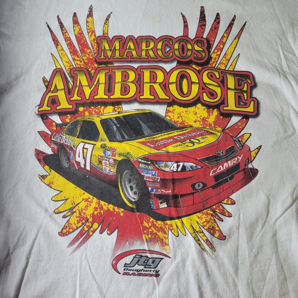 2010 #47 LITTLE DEBBIE 50TH ANNIV TEE SHIRT MARCOS AMBROSE LARGE NASCAR